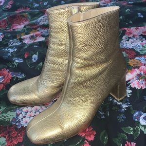 Maryam Nassir Zadeh metallic gold boots
